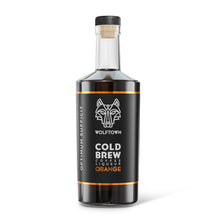 Load image into Gallery viewer, Wolftown cold brew coffee bottle on a white background. Orange version.